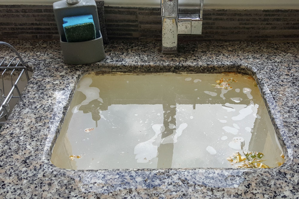 8 easy tips to free a clogged drain